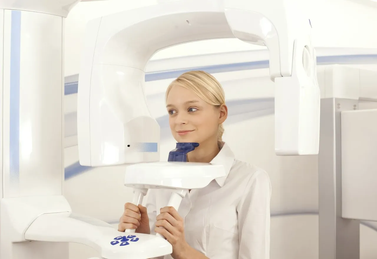 A patient positioned in the CT scanner at The Smile Center.